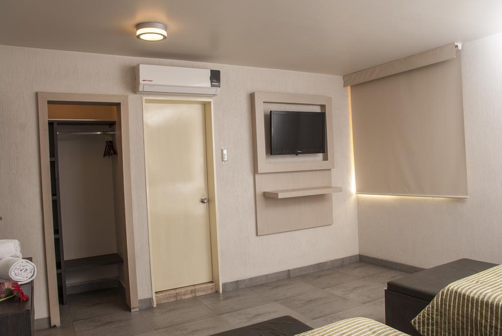 Hotel Expo Abastos Гвадалахара Номер фото